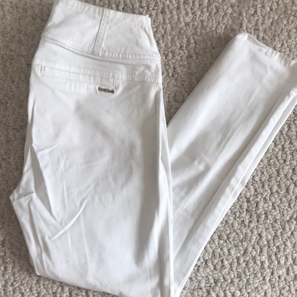High waisted white ankle skinny jeans